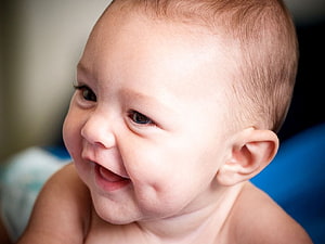 Smiling Indian Baby Boy Portrait with Soft Focus Background HD wallpaper