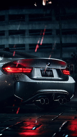 Rear View of a BMW M4 in the Rain with Glowing Red Taillights and Wet Asphalt Reflections HD phone wallpaper