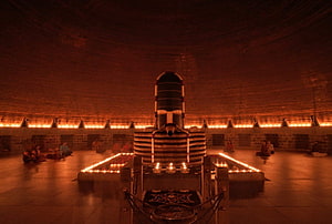 Dhyanalinga Sacred Shrine Illuminated by Rows of Oil Lamps in a Circular Meditation Hall HD wallpaper