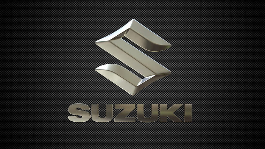 Suzuki Metallic S Logo on Dark Carbon Fiber Background HD wallpaper