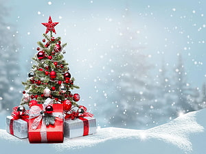 Festive Christmas Tree With Red Ornaments And Gift Boxes In Snowy Winter Landscape HD wallpaper