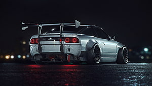Silver Nissan Skyline GT-R R34 Widebody with Large Rear Wing at Night HD wallpaper