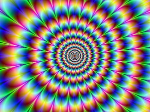 Vibrant Hypnotic Kaleidoscope Spiral with Radiating Rainbow Petals and Psychedelic Depth HD wallpaper