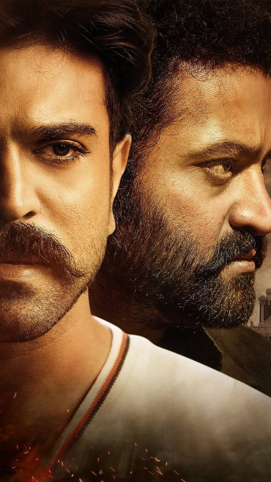 RRR Movie Poster Featuring Ram Charan and Jr NTR in Dramatic Close-Up HD phone wallpaper