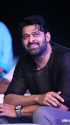 Prabhas Smiling Portrait in Black Shirt at Event HD phone wallpaper