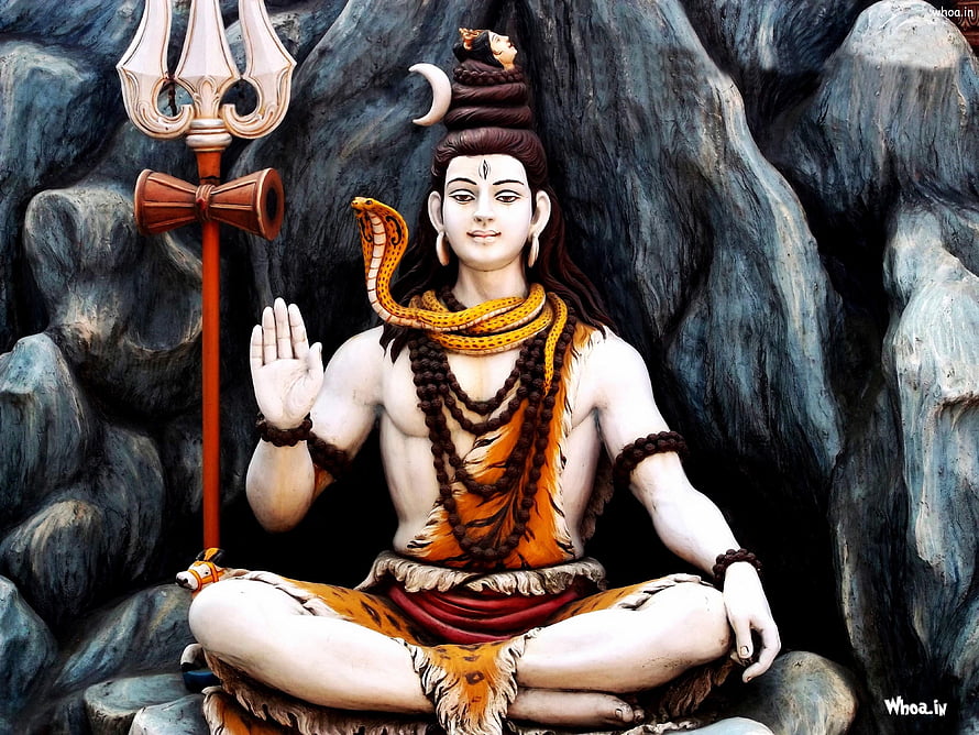 Lord Shiva Meditating in Cave with Trishul and Snake HD wallpaper
