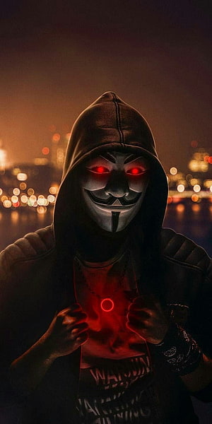 Grim Reaper Masked Figure in Hoodie with Glowing Red Eyes Against Night City Bokeh HD phone wallpaper