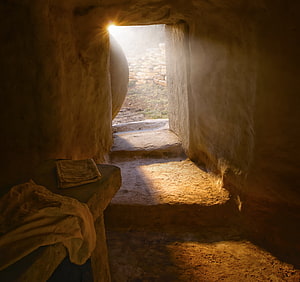 Sunlit Interior of the Garden Tomb with Stone Bench and Linen HD wallpaper