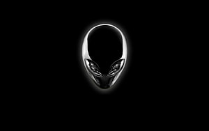Sleek Alienware Logo Glowing Against a Dark Background HD wallpaper