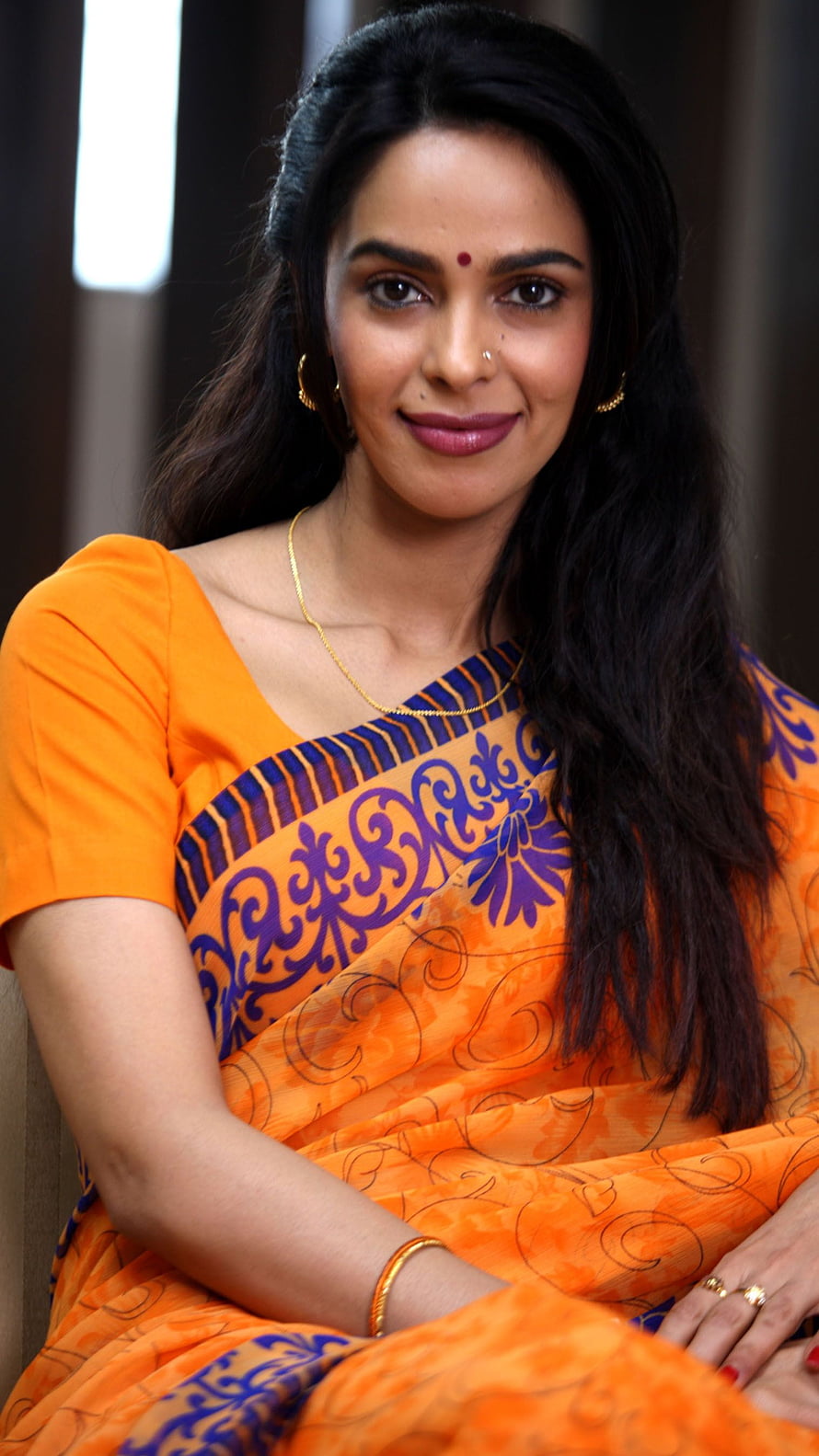 Mallika Sherawat in Vibrant Orange Saree with Traditional Gold Jewelry HD phone wallpaper