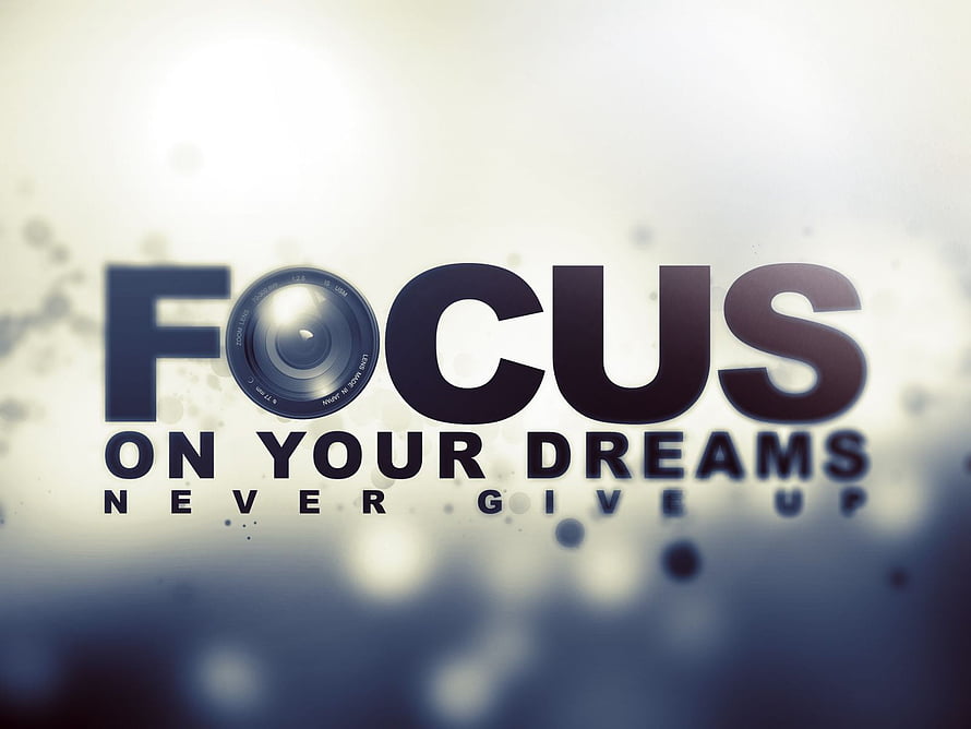 Inspirational Focus On Your Dreams Never Give Up Motivational Quote With Camera Lens Design HD wallpaper