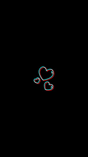 Minimalist 3D Heart Icons with Neon Red and Cyan Glow on Black Background HD phone wallpaper
