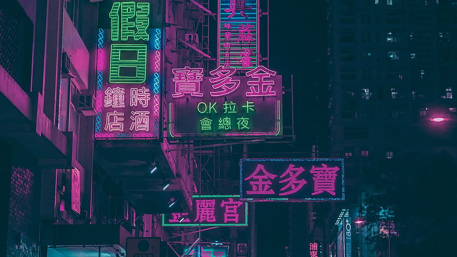 Neon-lit Hong Kong street at night with glowing Chinese signs and cyberpunk atmosphere HD wallpaper
