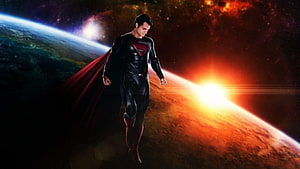 Superman in Man of Steel Suit Floating in Space Above a Planet HD wallpaper