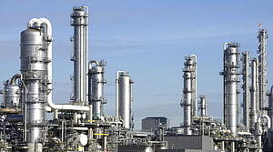 Modern Chemical Plant With Tall Distillation Columns And Industrial Piping HD wallpaper