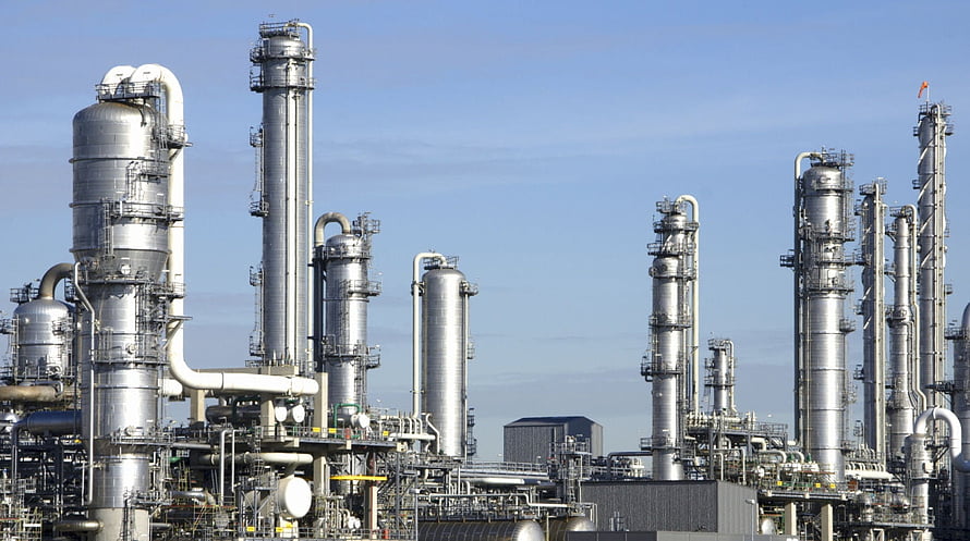 Modern Chemical Plant With Tall Distillation Columns And Industrial Piping HD wallpaper