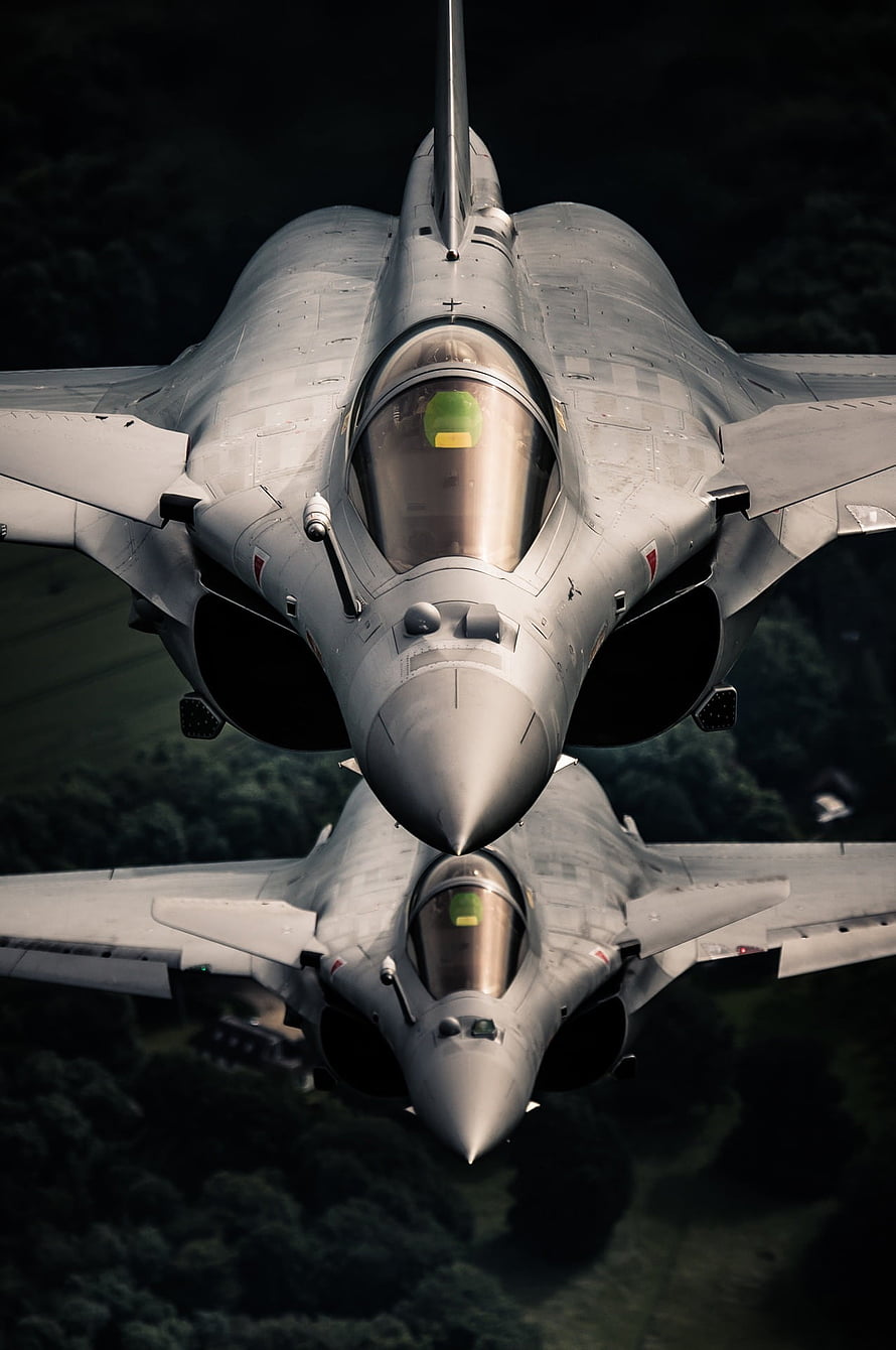 Dassault Rafale Fighter Jets in Tight Formation Over Forested Terrain HD phone wallpaper