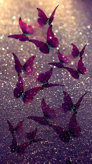 Vibrant Purple Butterflies on a Glittering Bokeh Background HD phone wallpaper