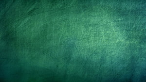 Scratched Green Chalkboard Surface with Faint Chalk Marks and Textured Background HD wallpaper