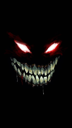 Menacing Demon Face with Glowing Red Eyes and Jagged Teeth in Darkness HD phone wallpaper
