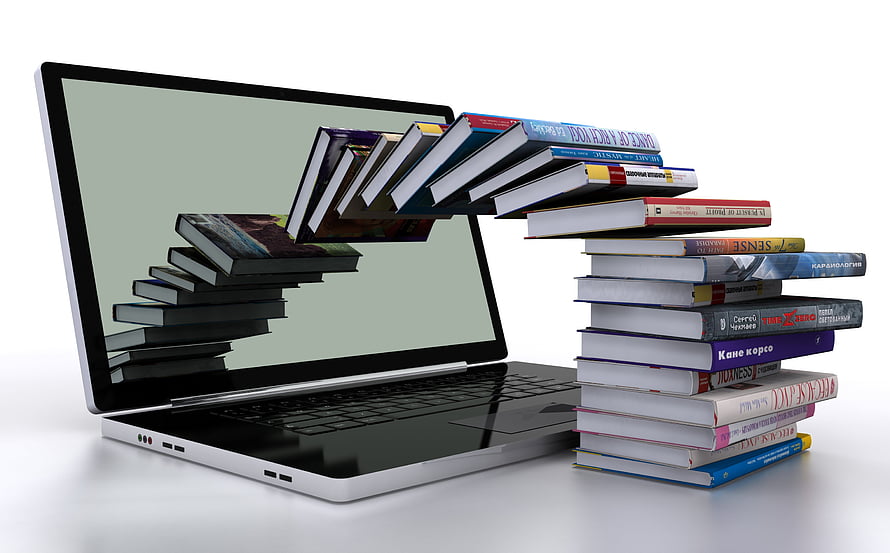 Laptop with Books Emerging from Screen Concept for Online Learning and Digital Education HD wallpaper