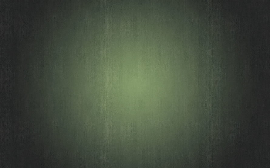 Dark Green Textured Surface with Soft Central Glow and Subtle Vertical Grain HD wallpaper