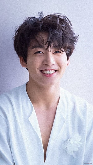 Jeon Jungkook BTS Portrait in White Shirt with Soft Smile and Messy Hair HD phone wallpaper