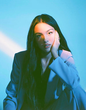 Olivia Rodrigo Portrait in Blue and Green Neon Lighting HD phone wallpaper