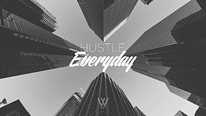 Black and White Urban Skyline with Hustle Everyday Typography HD wallpaper