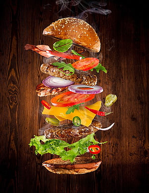 Exploded Cheeseburger with Grilled Beef Patties, Fresh Vegetables, and Melted Cheese on Dark Wood HD phone wallpaper