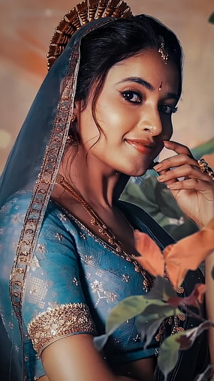 Priyanka Mohan in Traditional Indian Attire with Ornate Jewelry and Floral Elements HD phone wallpaper