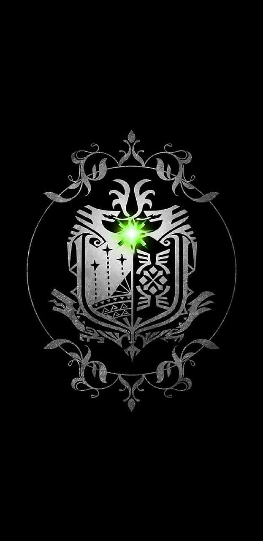 Monster Hunter World Emblem with Glowing Green Gem and Ornate Silver Crest on Black Background HD phone wallpaper