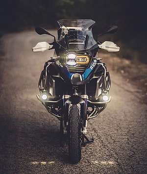 BMW R1250GS Adventure Motorcycle Front View on Gravel Road at Night HD phone wallpaper