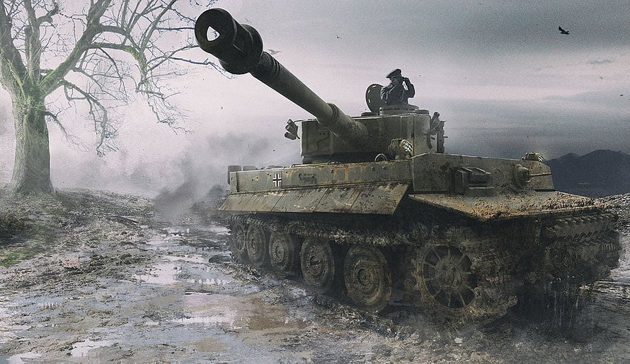 German Tiger I Heavy Tank Advancing Through Muddy Terrain in World War II HD wallpaper