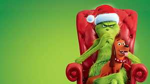 The Grinch and Max Sitting in a Red Armchair Wearing a Santa Hat HD wallpaper