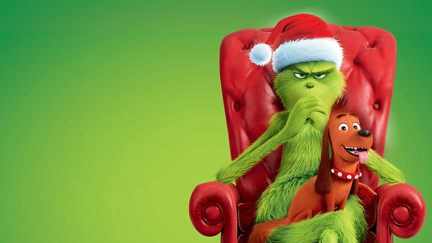 The Grinch and Max Sitting in a Red Armchair Wearing a Santa Hat HD wallpaper