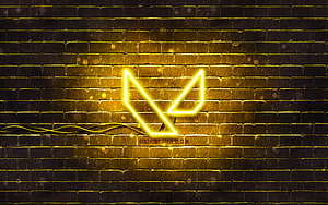 Glowing Yellow Valorant Logo Neon Sign on Dark Brick Wall HD wallpaper
