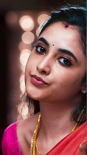 Priyanka Mohan Portrait in Traditional Saree with Warm Bokeh Background HD phone wallpaper