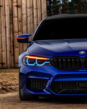 Blue BMW M5 F90 Front End with Distinctive LED Headlights and Signature Grille HD phone wallpaper