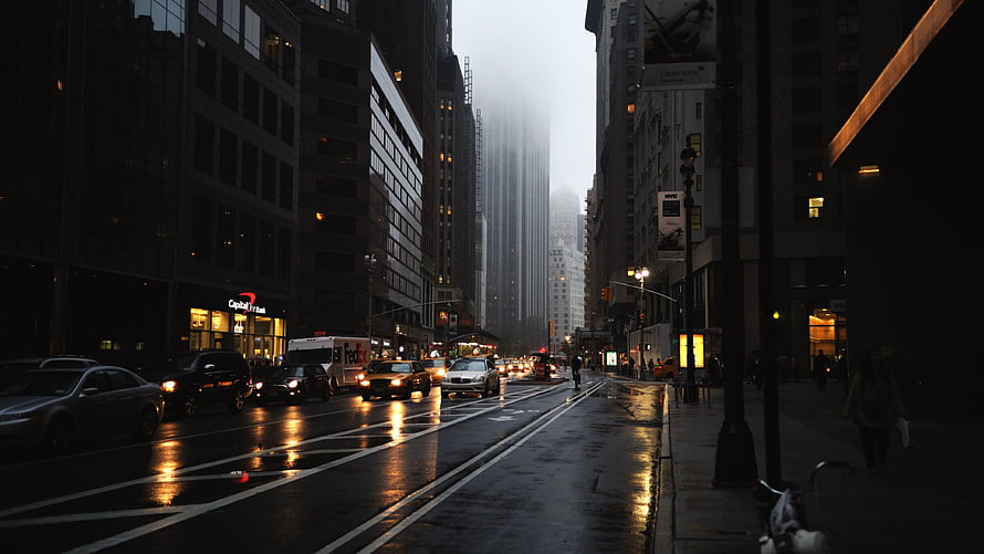 Moody Rainy Street Scene in New York City with Wet Asphalt and City Lights HD wallpaper