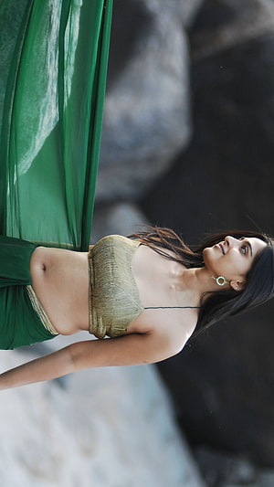Anushka Shetty in Green Saree and Gold Blouse with Flowing Fabric HD phone wallpaper