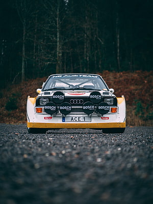 Audi Sport Quattro S1 E2 Rally Car Front View on Gravel Road HD phone wallpaper