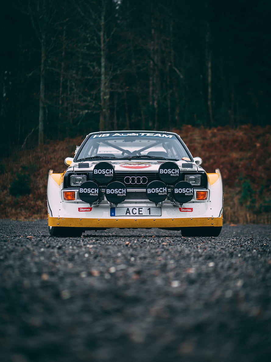 Audi Sport Quattro S1 E2 Rally Car Front View on Gravel Road HD phone wallpaper