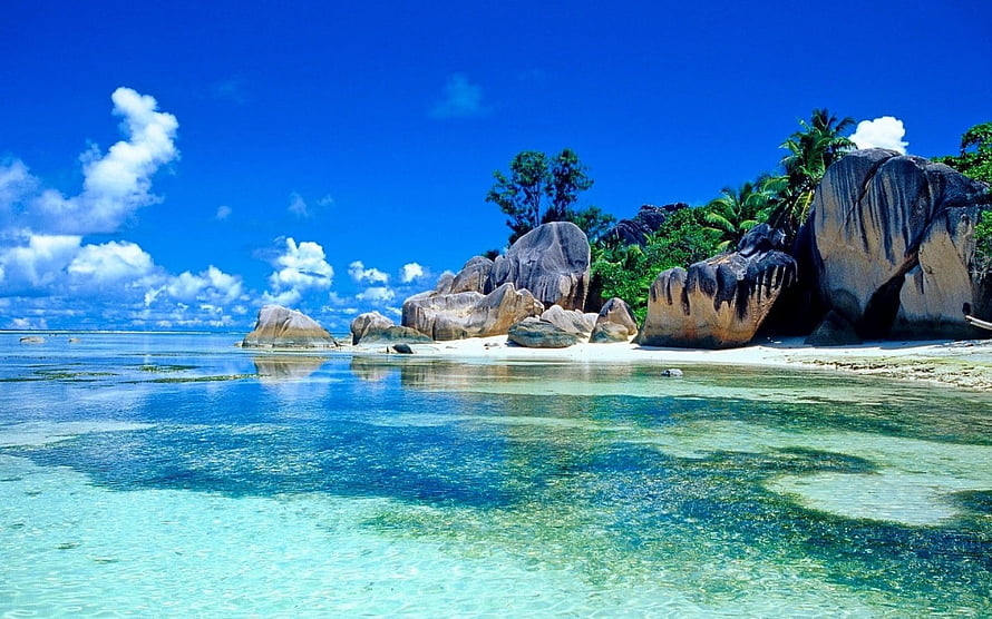 Tropical Island Beach With Granite Boulders And Crystal Clear Turquoise Water HD wallpaper