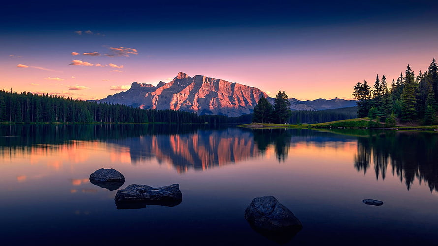 Serene Mountain Lake at Sunset with Perfect Reflections and Pine Forest HD wallpaper