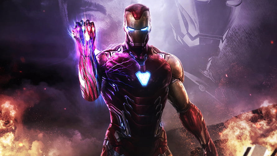 Iron Man in Advanced Armor with Glowing Arc Reactor and Energy Hand HD wallpaper