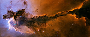 Vibrant Orange and Blue Nebula Clouds with Scattered Stars in Deep Space HD wallpaper