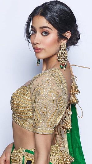Janhvi Kapoor in Gold Embroidered Choli and Green Lehenga with Traditional Jhumka Earrings HD phone wallpaper