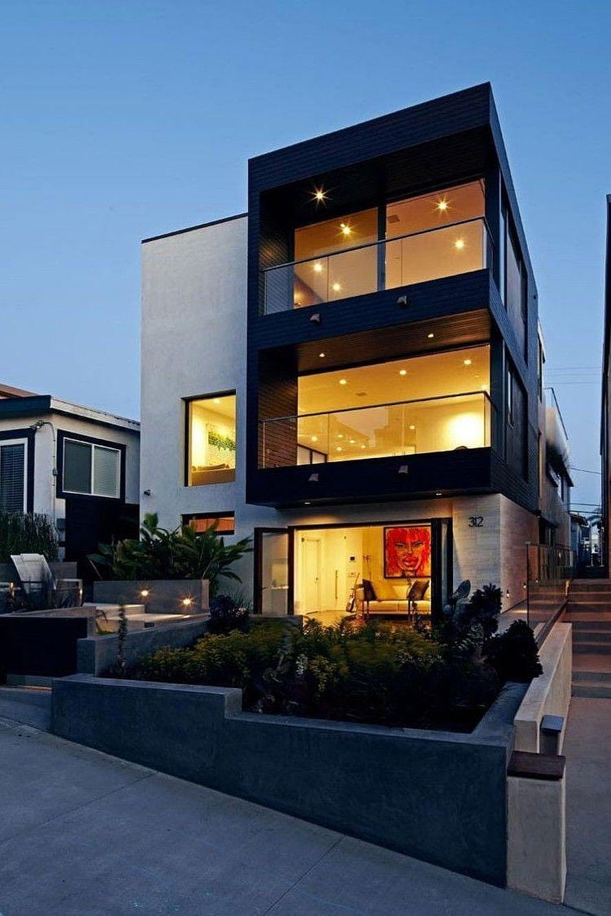 Contemporary Three-Story Residence with Glass Balconies at Dusk HD phone wallpaper
