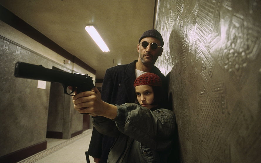 Leon The Professional Movie Scene with Gun in Dimly Lit Corridor HD wallpaper